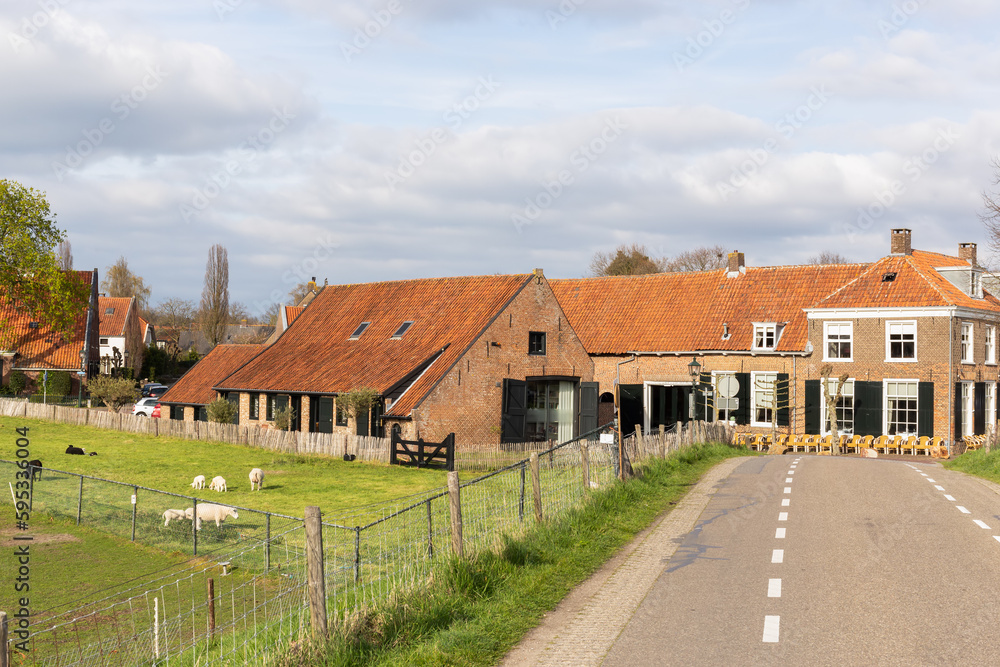 View of the picturesque and rural village of Amerongen, located at the foot of the Amerongse Berg near the Nederrijn. View of the picturesque and rural village of Amerongen, located at the foot of the Amerongse Berg near the Nederrijn.