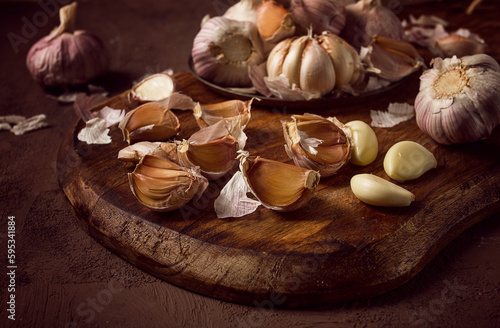 Fresh garlic, on a dark background, top view, food concept,
