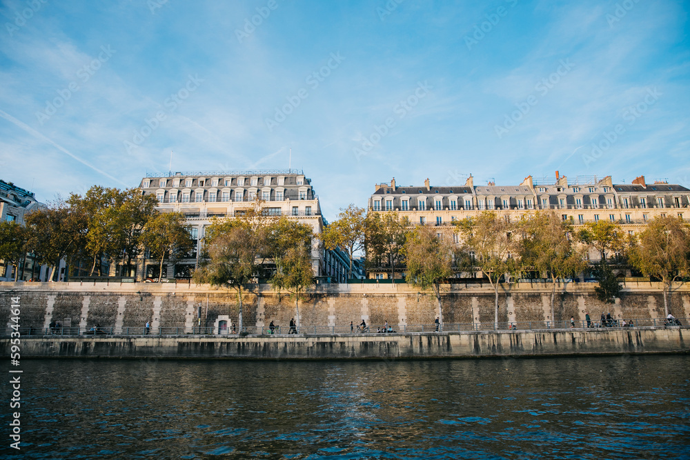Looking Out across the Seine river to the riverbank and buildings on a clear day