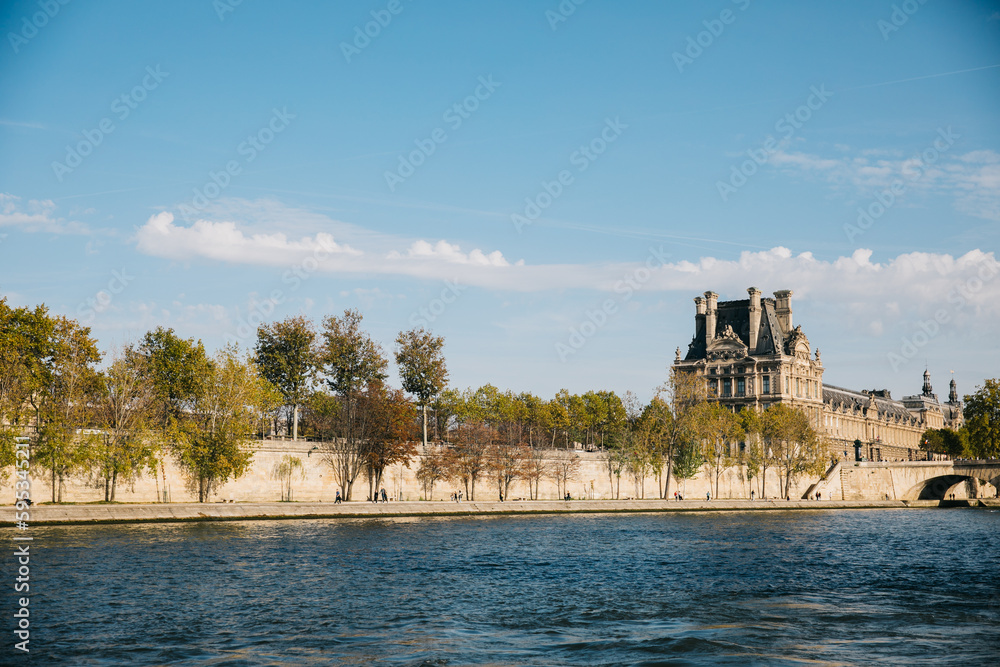 Looking Out across the Seine river to the riverbank and buildings on a clear day