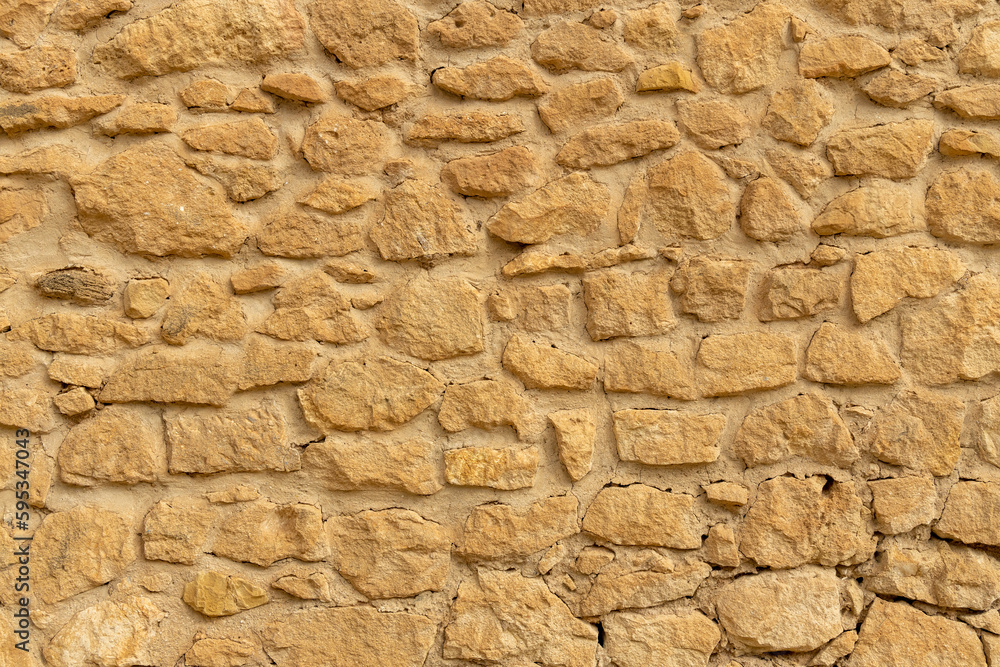 Texture of a stone wall. Old castle stone wall texture background. Stone wall as a background or texture. Part of a stone wall, for background or texture