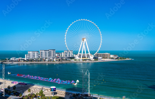 The Ain Dubai or Dubai Eye Observation Wheel on BlueWaters Island off the coast by JBR beach in the UAE © steheap