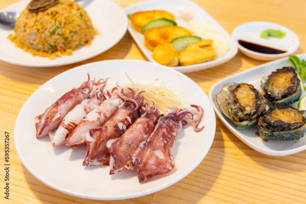 Chinese style seafood arranged dishes in restaurant
