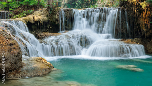 Fototapeta Naklejka Na Ścianę i Meble -  Turquoise water flowing down the Kuan si falls near Luang Prabang - Laos