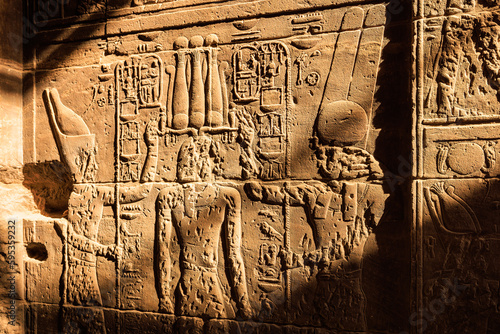 Engraving depicting pharaoh's lives in Isis temple - Philae - Aswan - Egypt photo