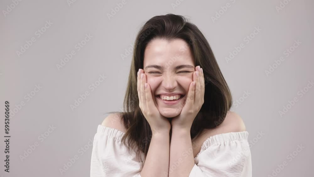 beautiful girl with a smiling face and holding a pipette with serum in front of her face, beauty with makeup and a perfect smile beautiful girl with a smiling face and holding a pipette with serum in front of her face, beauty with makeup and a perfect smile
