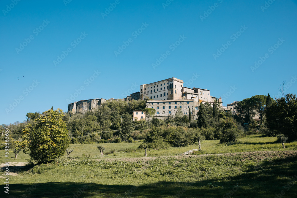 View of Orsini Palace, Bomarzo, Lazio, Italy hillside on a clear day