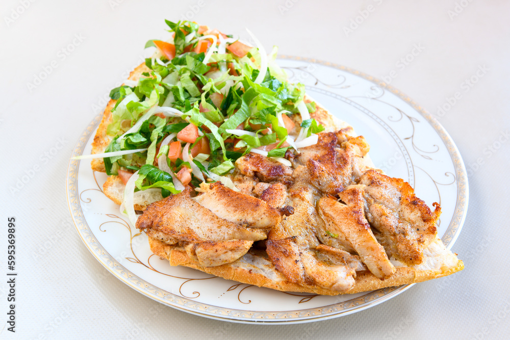 Chicken wings barbeque in a dish with BBQ grill sauce . Izgara tavuk kelebek sis kanat. Tavuk sis, gogus. Chicken wings barbeque in a dish with BBQ grill sauce . Izgara tavuk kelebek sis kanat. Tavuk sis, gogus.