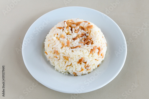 Traditional delicious Turkish food; Turkish style rice pilaf (Turkish name; Arpa sehriyeli. tavuk, kuru fasulyeli, pirinc pilavi)