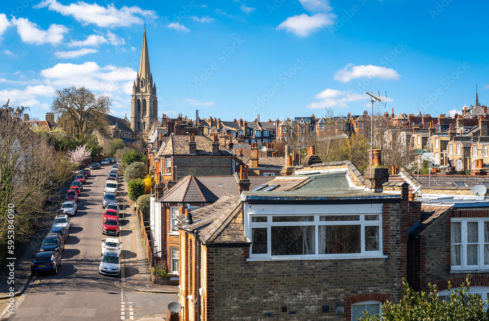 Fototapeta premium Muswell Hill suburban district of the London Borough of Haringey and the tower of St James Church on a sunny spring day