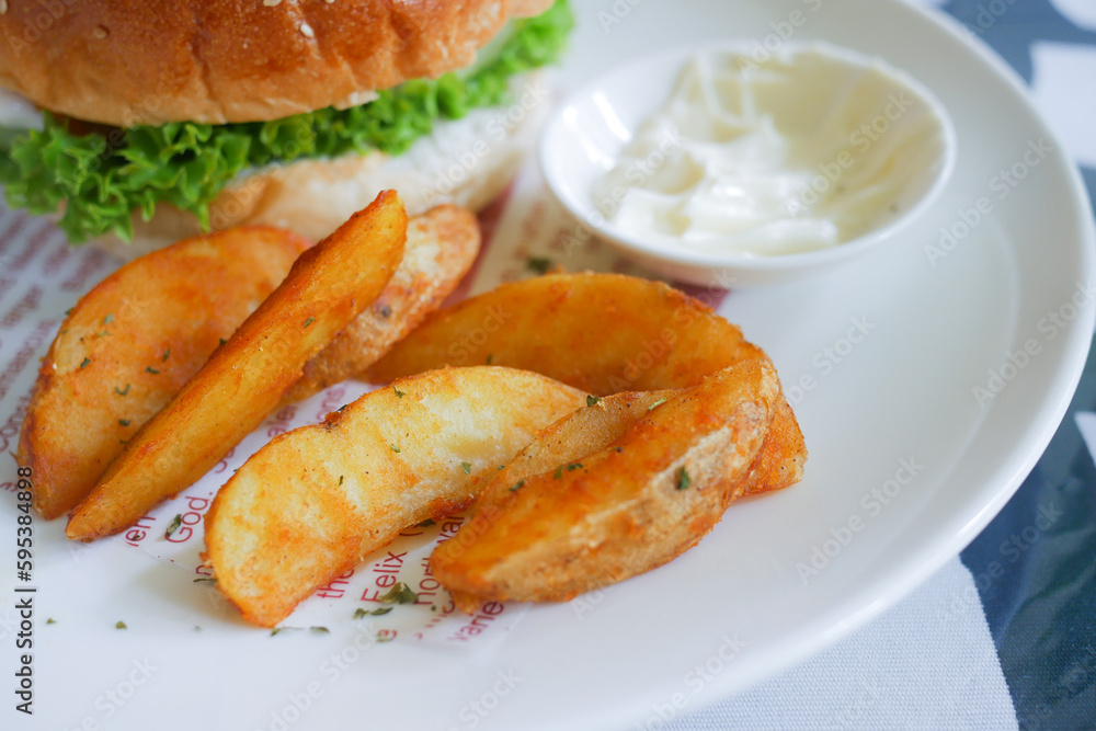 Tasty freshly made wage potato chips in a plate Tasty freshly made wage potato chips in a plate