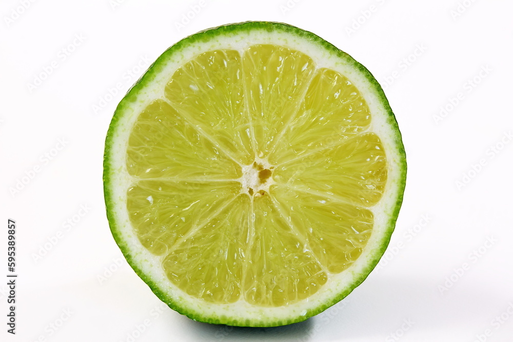 fresh cut lemon lime citrus fruit slice closeup in white background fresh cut lemon lime citrus fruit slice closeup in white background