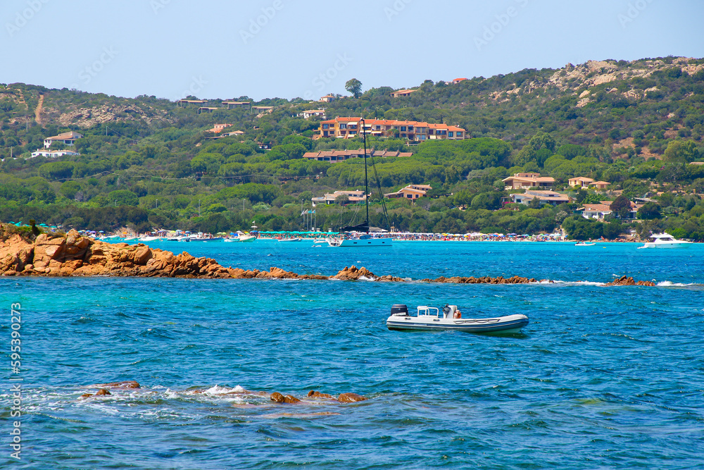 Obraz premium Inflatable dinghy moored in the bay of Porto Istana on the (