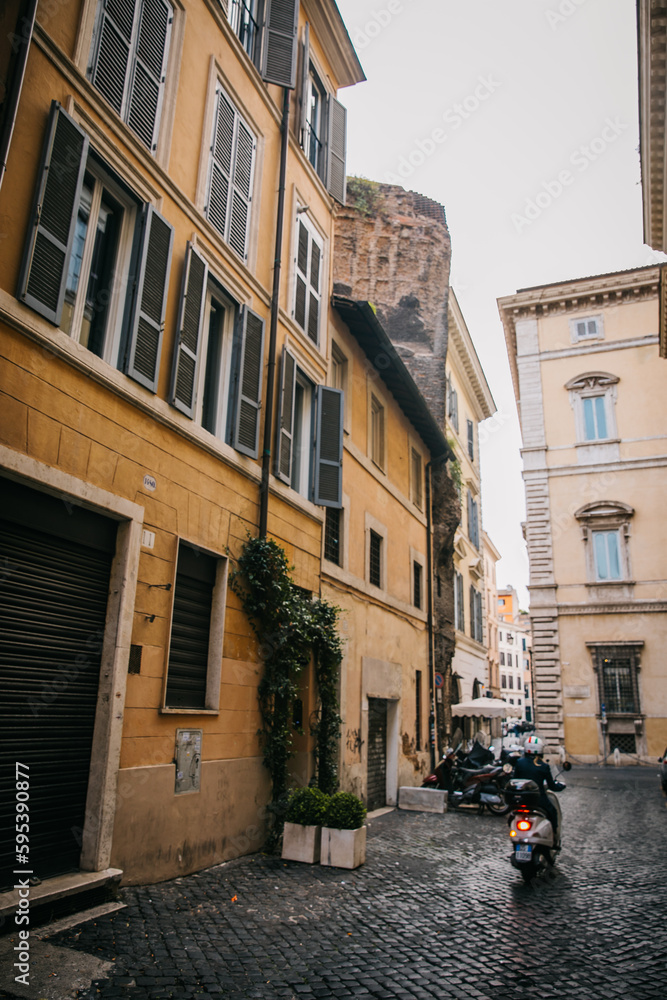 Walking through the city streets of ancient Rome in Italy