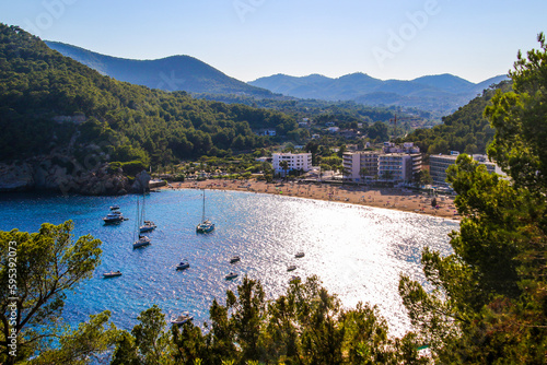 Aerial view of the beach of Cala de Sant Vicent in the east of Ibiza in the Balearic islands photo