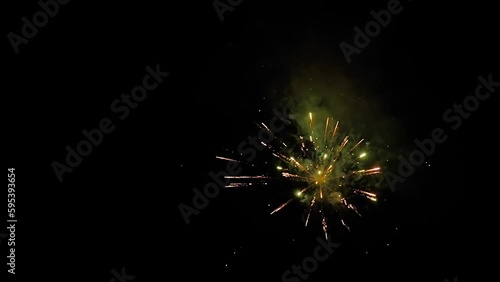 Wallpaper Mural Colorful bright orange, red and green fireworks with colored flames and sparks in the dark sky at night. Evening time, low light illumination. Holiday, celebration and anniversary concept Torontodigital.ca