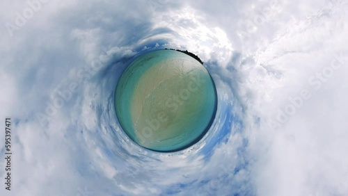 Little Tiny Planet 360 Degree Footage of a sandbank on a paradise island at the Maldives on a cloudy day