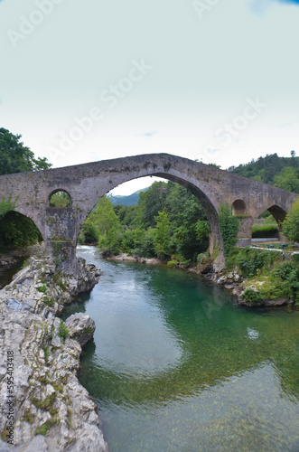The Roman bridge of Cangas de Onis, in Asturias, Spain, below, the river Sella.