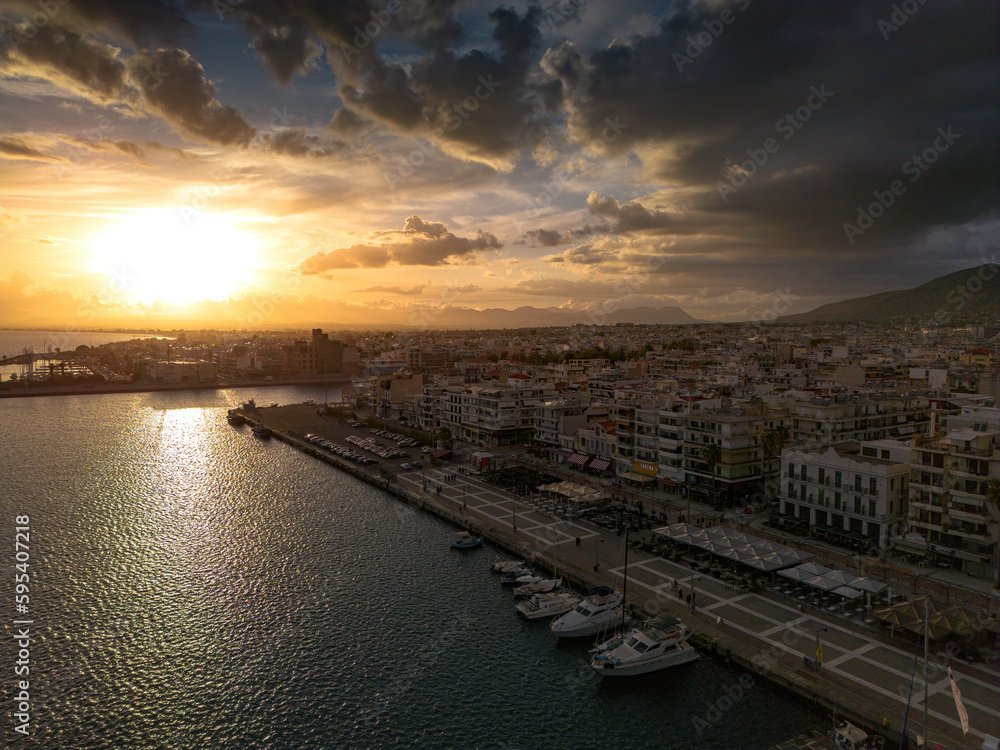 Aerial iconic sunset view over the port of Kalamata seaside city in Messenia, Greece Aerial iconic sunset view over the port of Kalamata seaside city in Messenia, Greece