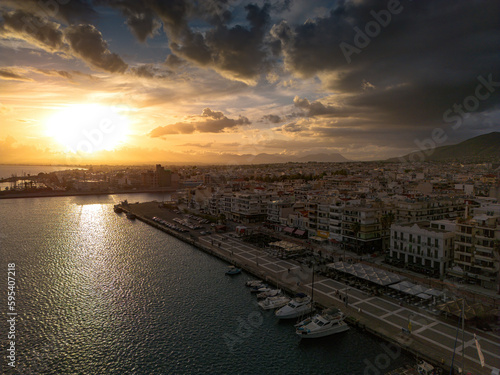 Aerial iconic sunset view over the port of Kalamata seaside city in Messenia, Greece © panosk18