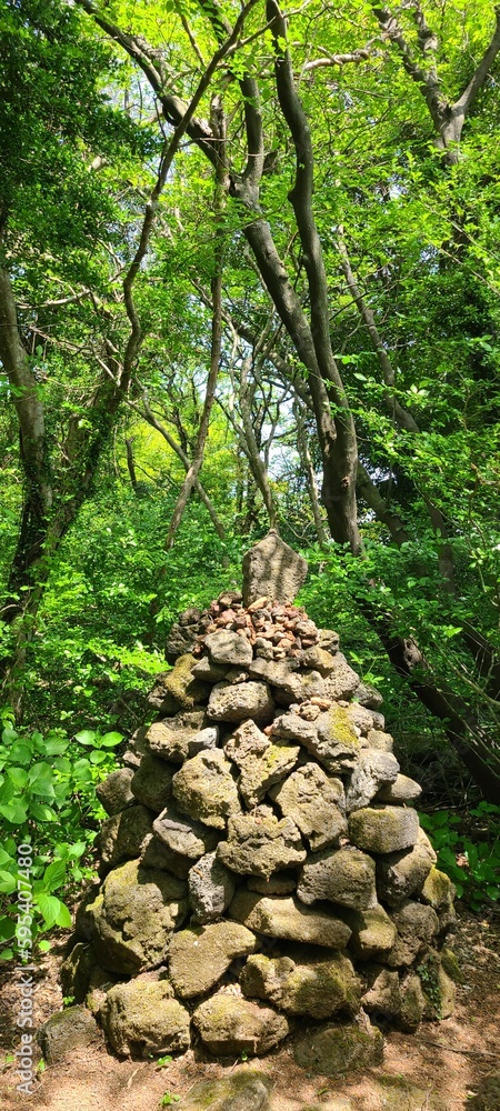 stone tower at the forest in Jeju Island stone tower at the forest in Jeju Island