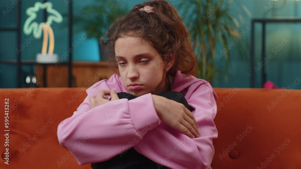 Portrait of sad Caucasiangirl suffers from unfair situation