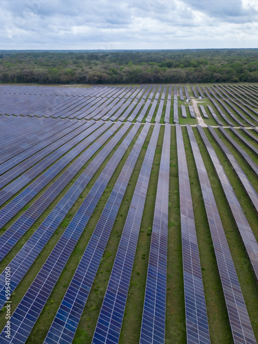 solar panels with sunny sky.  Blue solar panels.  background of photovoltaic modules for renewable energy. clean energy 