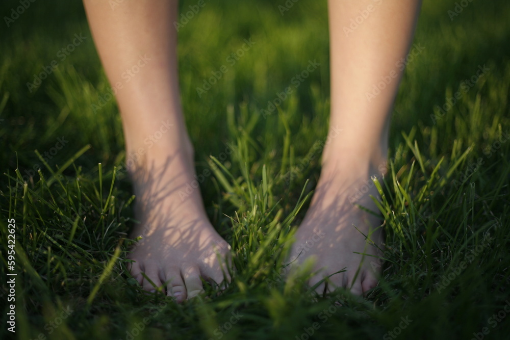 feet in grass