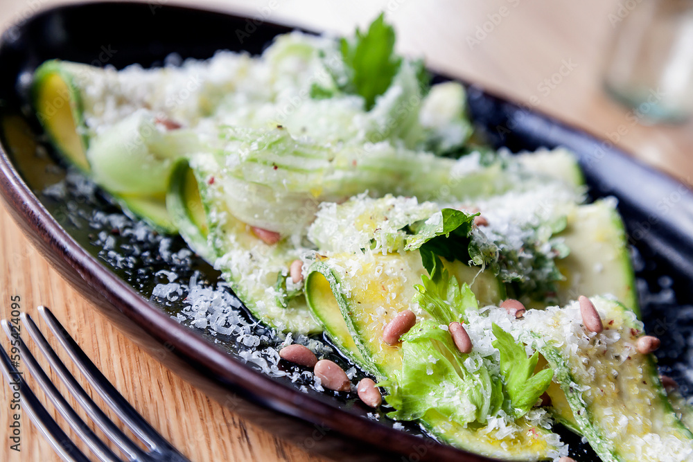 Zucchini salad with parmesan cheese and pine nuts Zucchini salad with parmesan cheese and pine nuts