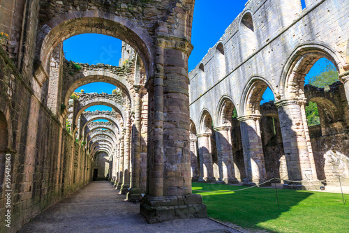England  North Yorkshire  Ripon. Fountains Abbey  Studley Royal. UNESCO World Heritage Site. National Trust  Cistercian Monastery. Ruins of Church Abbey arches.
