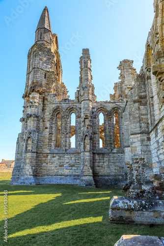 England, North Yorkshire, Whitby. North Sea, East cliff. English Heritage site, ruins of Benedictine abbey, Whitby Abbey, monastery.