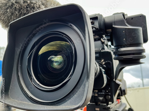Professional Broadcast Camera Lens on Set Background