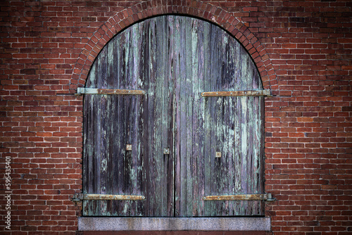 old wooden door in wall