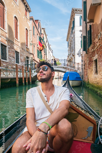 tourist on a gondola in venice italy © Angel