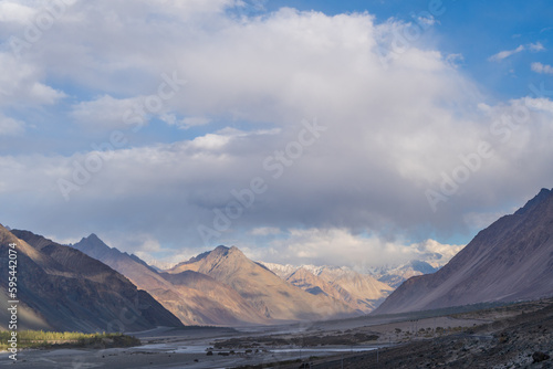 scenery of majestic mountains and cloudy sky at ladkah, India