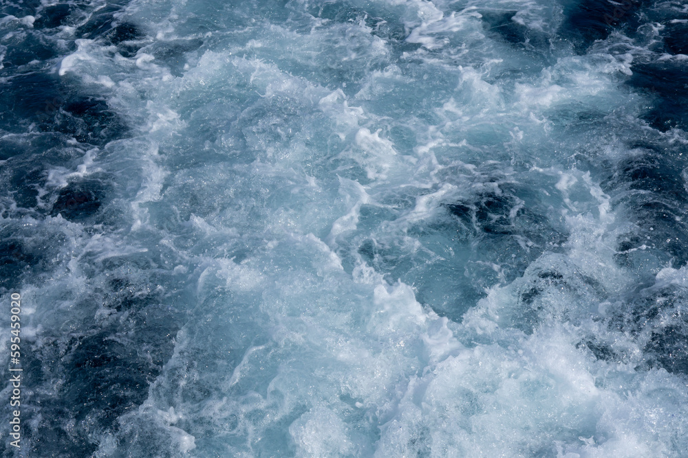 Fototapeta premium Background shot of aqua sea water surface. Red sea. Blue ocean water texture background. Surface of the sea.