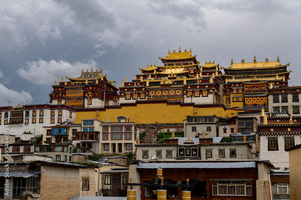Songzanlin Temple or the Ganden Sumtseling Monastery also known as little Potala Palace in Lhasa, is a Tibetan Buddhist monastery located in Zhongdian city ( Shangri-La) Yunnan, China Songzanlin Temple or the Ganden Sumtseling Monastery also known as little Potala Palace in Lhasa, is a Tibetan Buddhist monastery located in Zhongdian city ( Shangri-La) Yunnan, China