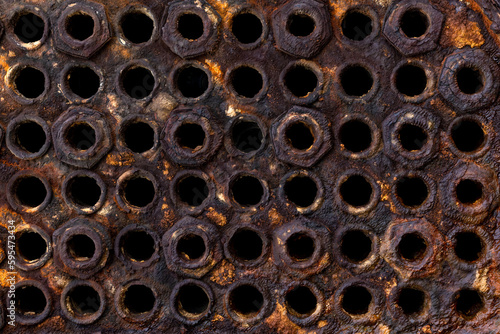 dark rusted steel with holes