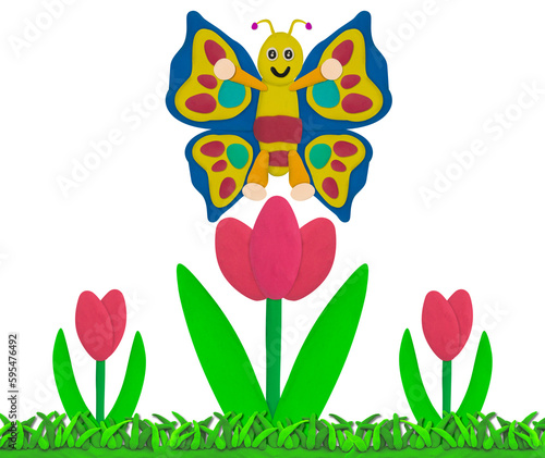 butterfly on pink plasticine tulip on grass field on white background