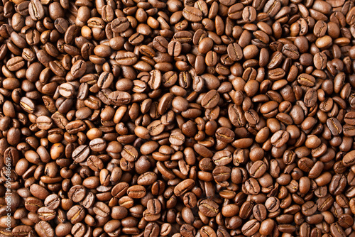 Freshly roasted coffee beans background.