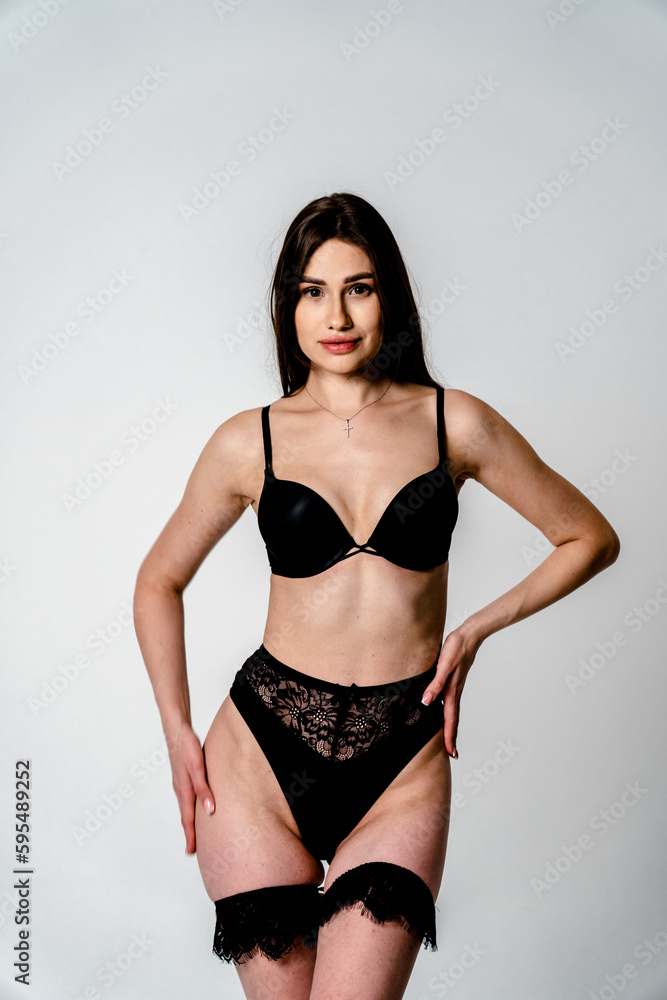 Sexy girl in black lingerie posing in studio Sexy girl in black lingerie posing in studio
