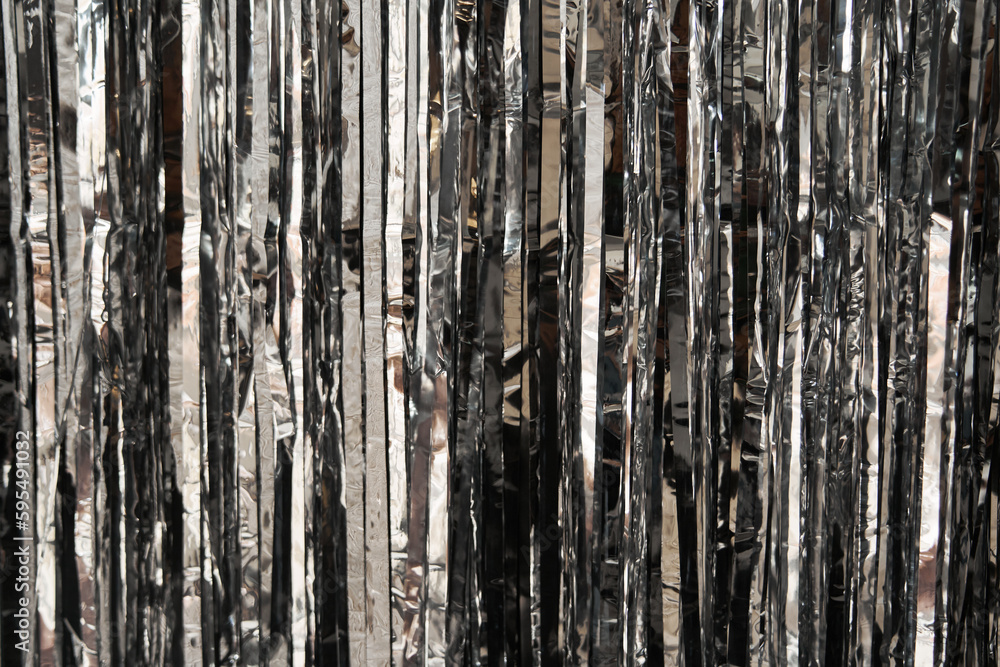 Silver rain, New Year's festive background with brilliance and with copy space. High quality photo Silver rain, New Year's festive background with brilliance and with copy space. High quality photo
