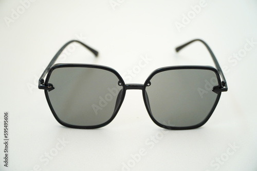Black sunglasses isolated on white background for applying on a portrait or a photo