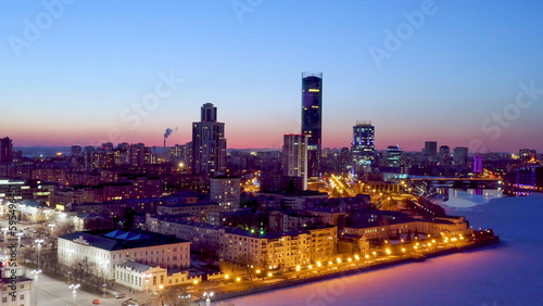 Ekaterinburg, Russia. Night city in the early spring. Dam, Silhouettes of skyscrapers, Aerial View