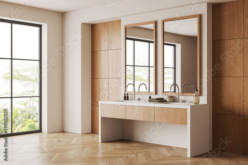 Cozy bathroom interior with double sink  mirror and panoramic window