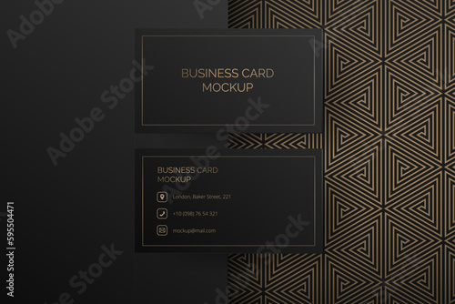 Business card mock up template. Abstract art deco design in black and gold features geometric triangles, mosaic pattern. Identity card showcase, luxury style. Perfect mockup for corporate branding