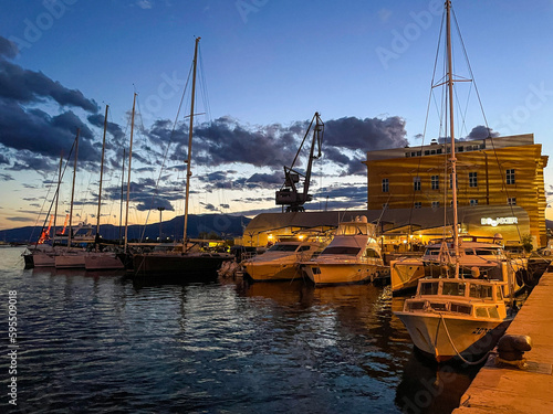 boats in the harbor in evening