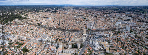 Aerial view around the old town of the city Nîmes in France on a sunny day in spring. 