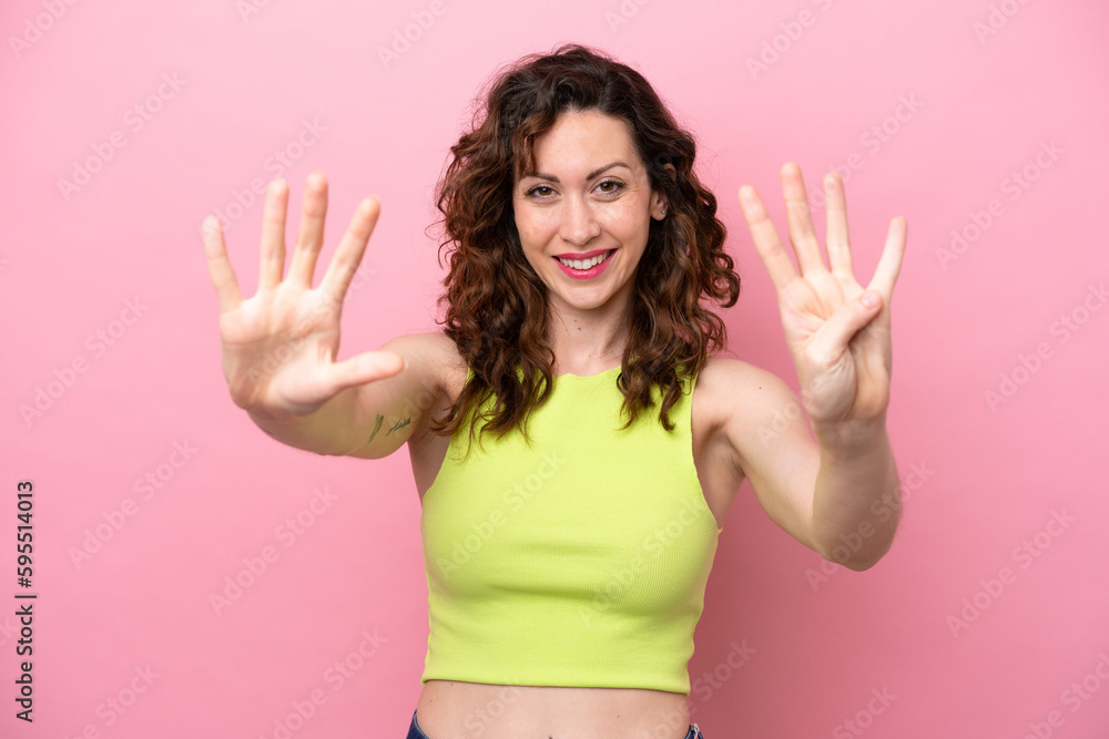 Young caucasian woman isolated on pink background counting nine with fingers Young caucasian woman isolated on pink background counting nine with fingers