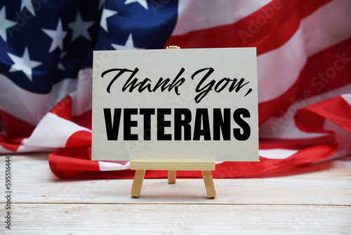 Thank You, Veterans text messege and USA flag. American holiday background